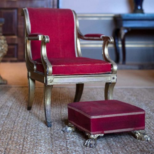 Detail of A Regency gilded mahogany open armchair and footstool supplied by Russell, Valance & Evans