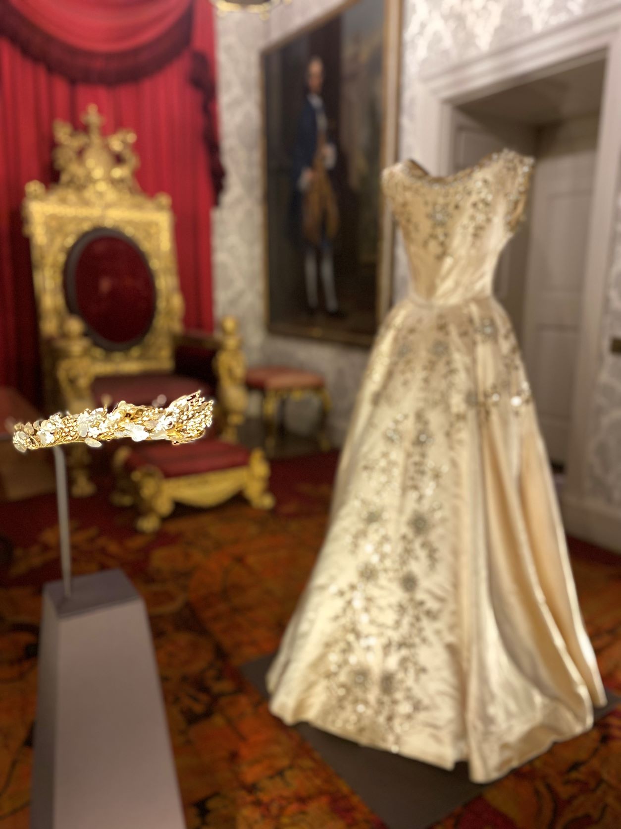 The Norman Hartnell dress and headress worn by Lady Jane Heathcote-Drummond-Willoughby as Maid of Honour at the Queen's coronation